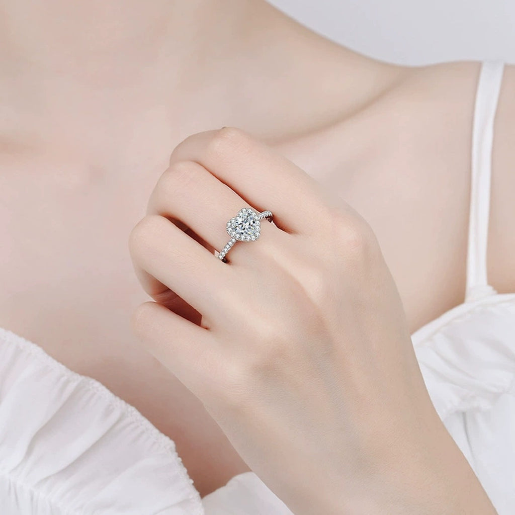 Heart Cut Moissanite Ring with CZ worn on hand to show scale and ring profile