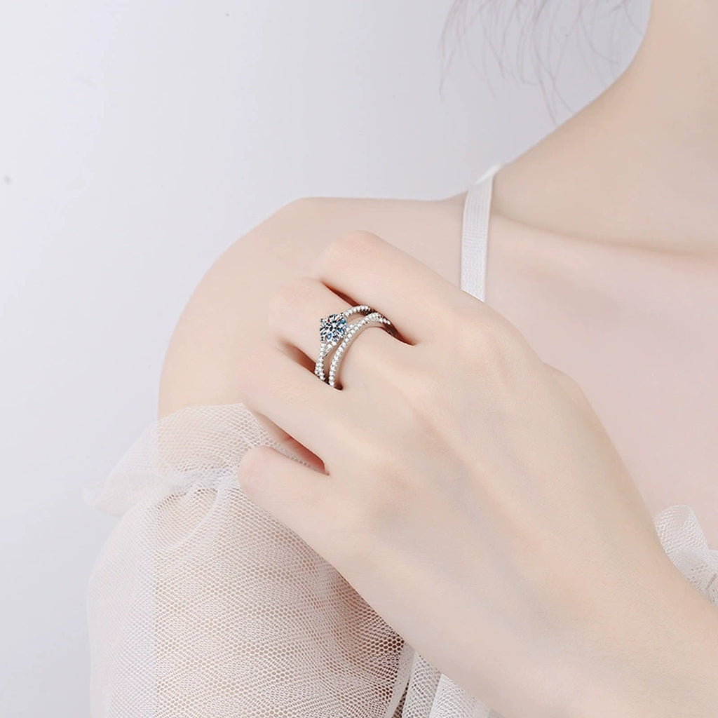 Round Moissanite Split Shank Ring with CZ worn on hand to show scale and ring profile