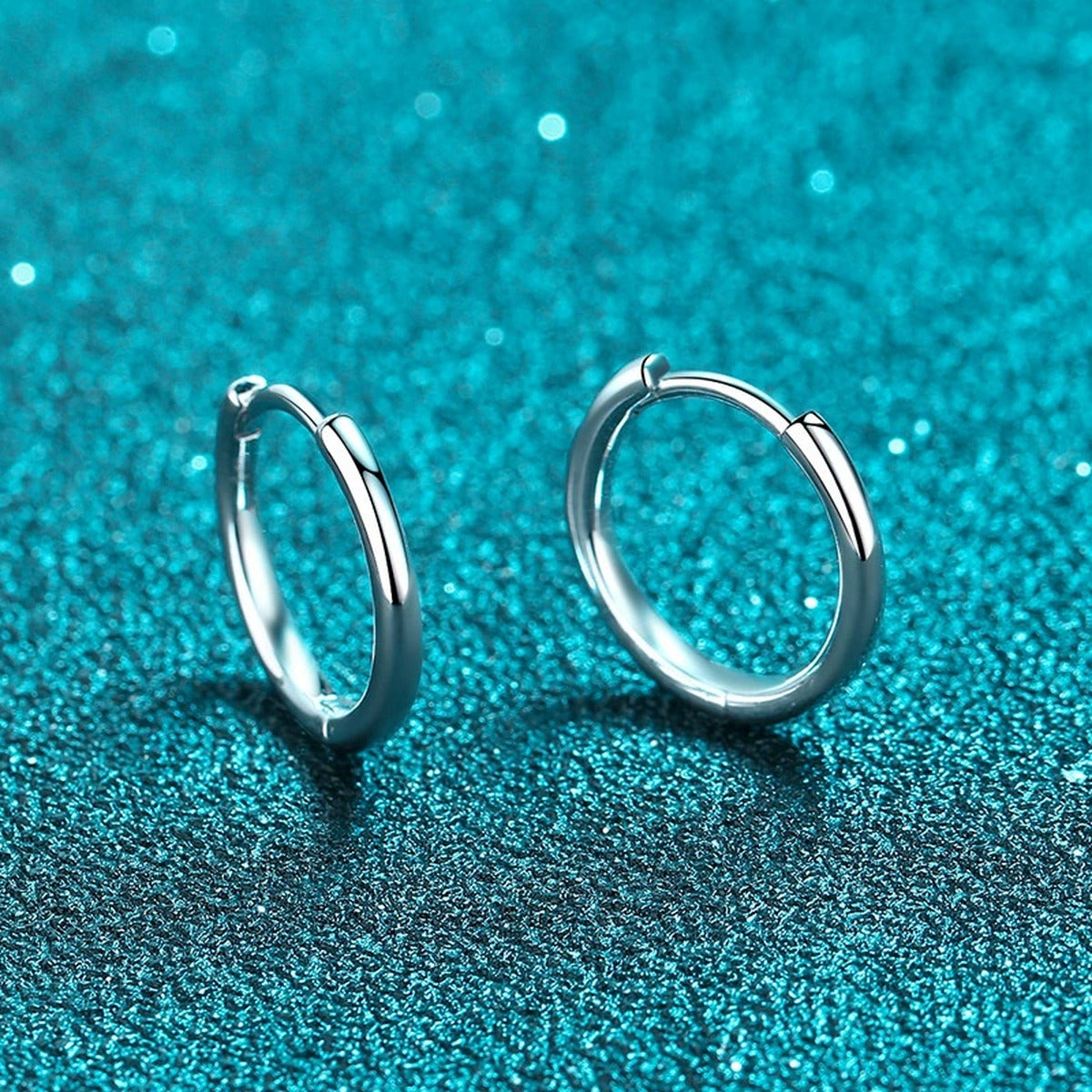 Minimal Huggie Hoop Earrings in Rhodium-Plated S925 sterling silver product scene view showing front detail