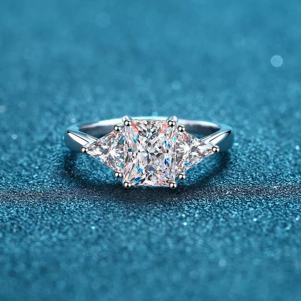 Emerald and Radiant Cut Moissanite Ring product view showing moissanite setting and rhodium finish