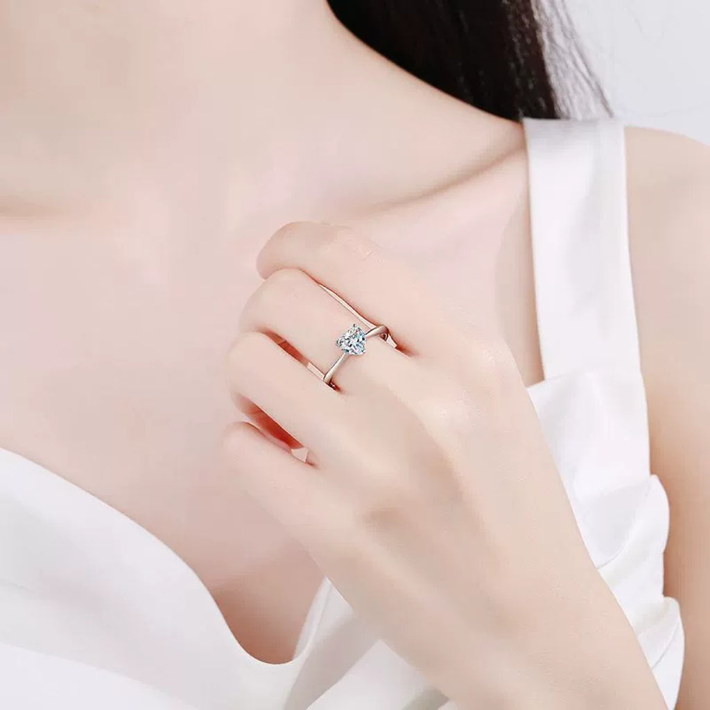 Heart Cut Moissanite Solitaire Ring worn on hand to show scale and ring profile