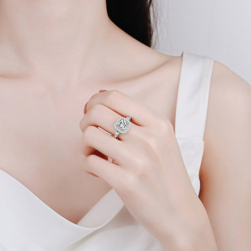 Asscher Cut Moissanite Halo Engagement Ring with CZ in Rhodium-Plated S925 Sterling Silver worn on hand, showing scale, finger coverage, and rhodium-plated finish