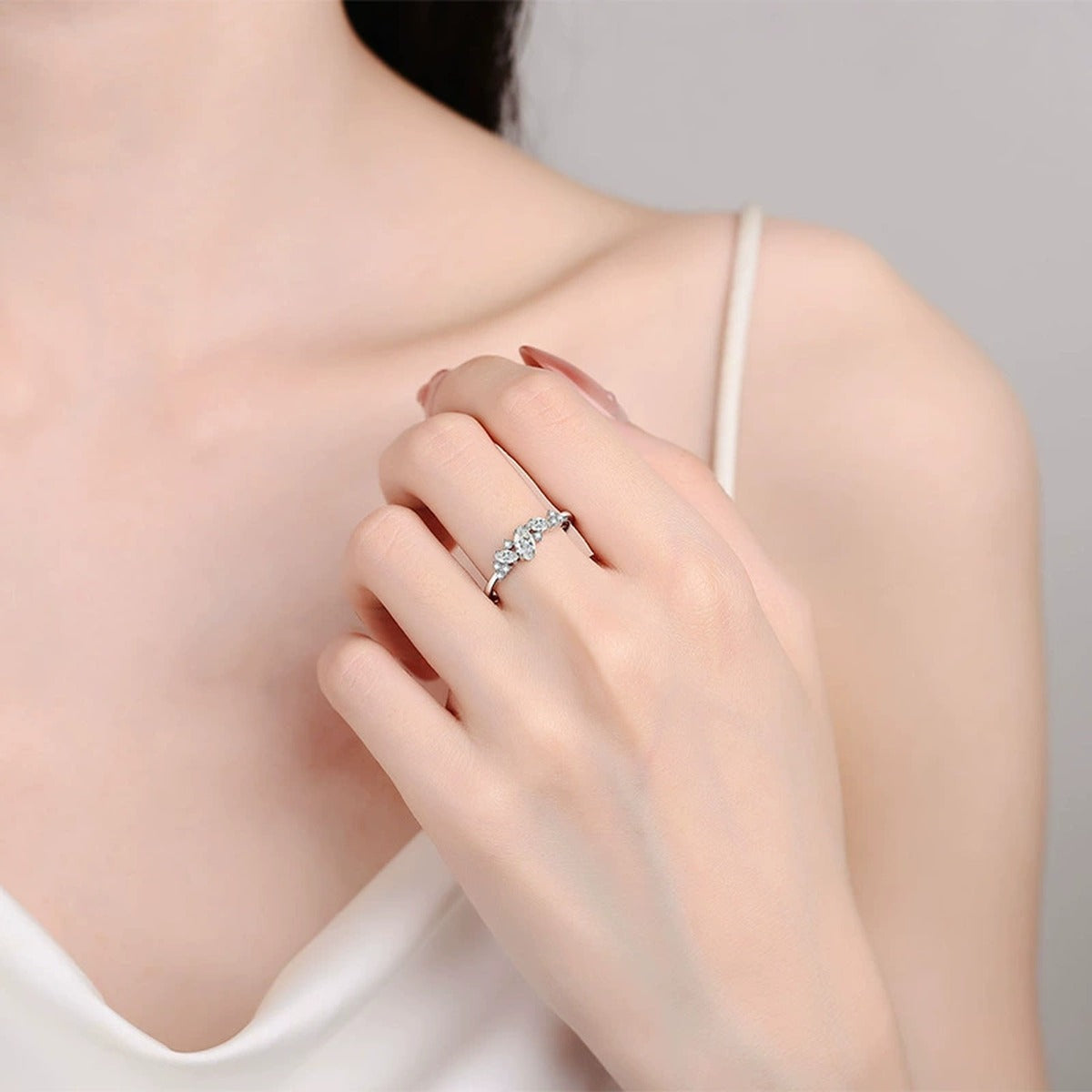 Marquise and Round Moissanite Stackable Ring worn on hand to show scale, band width, and ring profile