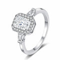 Emerald and Radiant Cut Moissanite Engagement Ring with CZ in rhodium-plated S925 sterling silver on clean white background