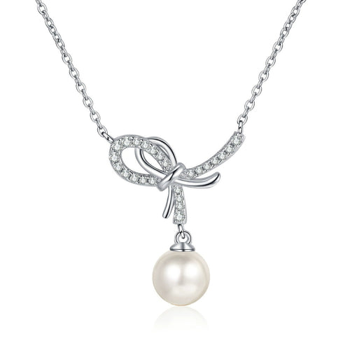 Bow Moissanite Pearl Pendant Necklace in Rhodium-Plated S925 sterling silver white background product photo showing open bow pearl pendant with small round moissanite accents