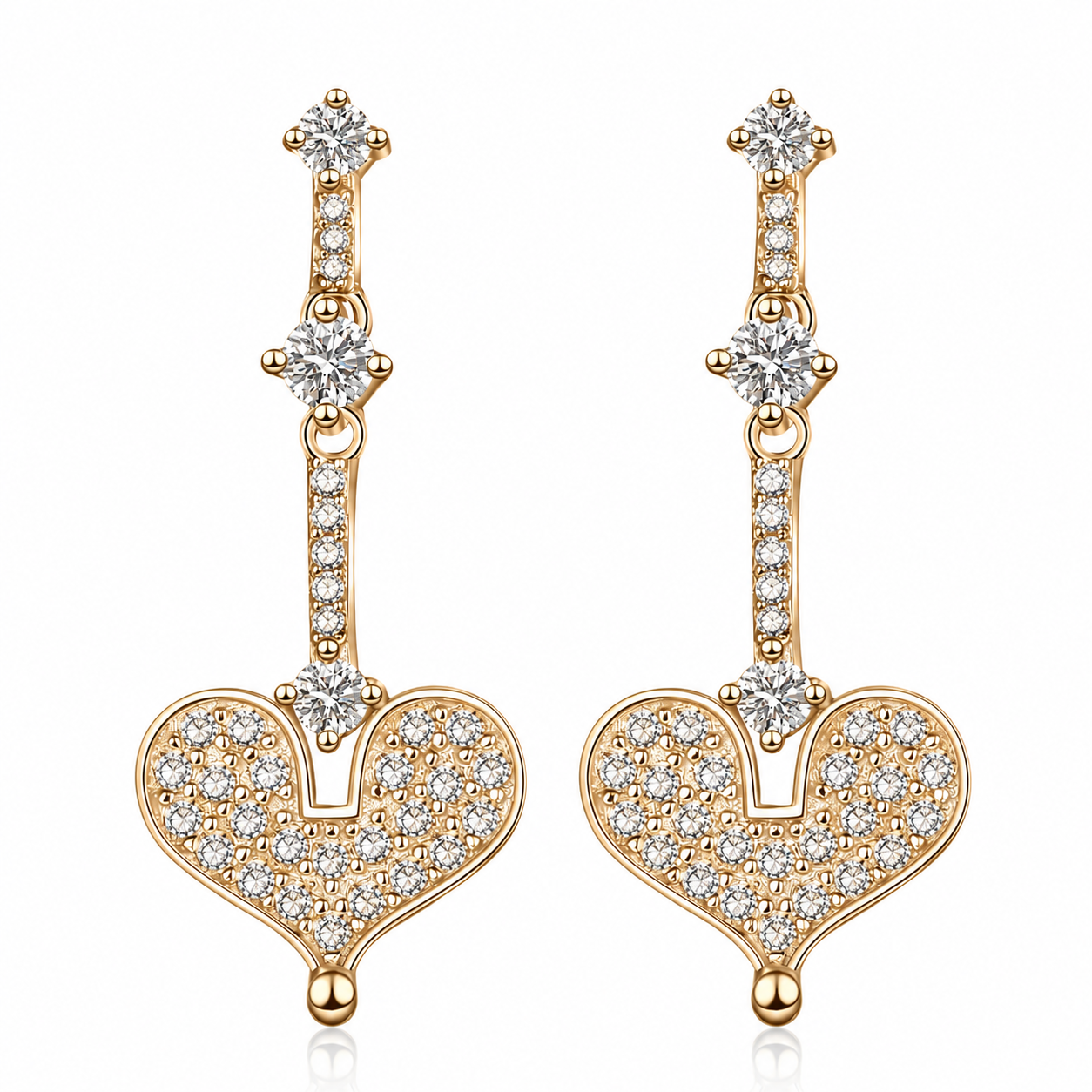 A pair of gold-plated drop earrings featuring a pavé heart-shaped pendant and clear cubic zirconia stones, shown on a plain white background.