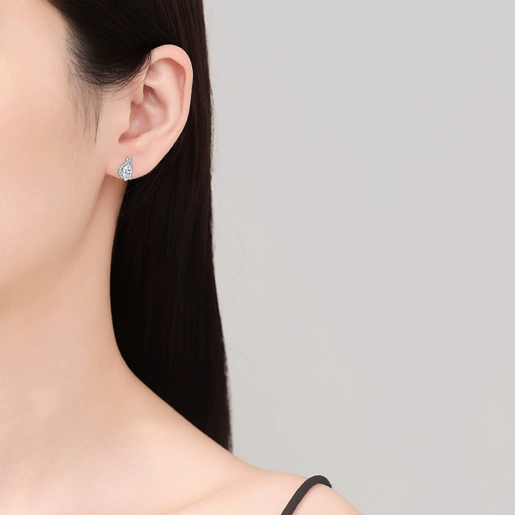 Marquise Moissanite Stud Earrings with CZ in White Gold-Plated S925 worn on ear by model