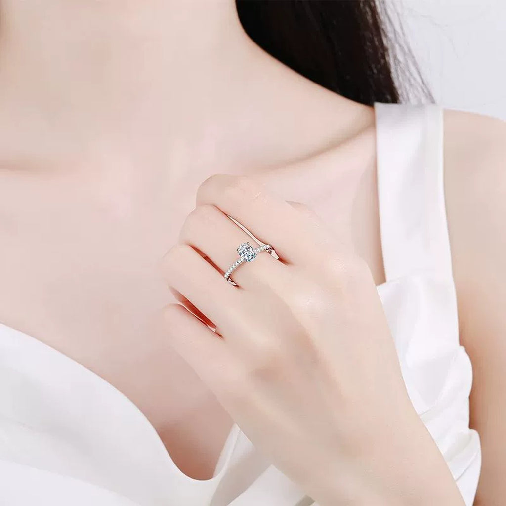Radiant Cut Moissanite Engagement Ring with CZ worn on hand by model