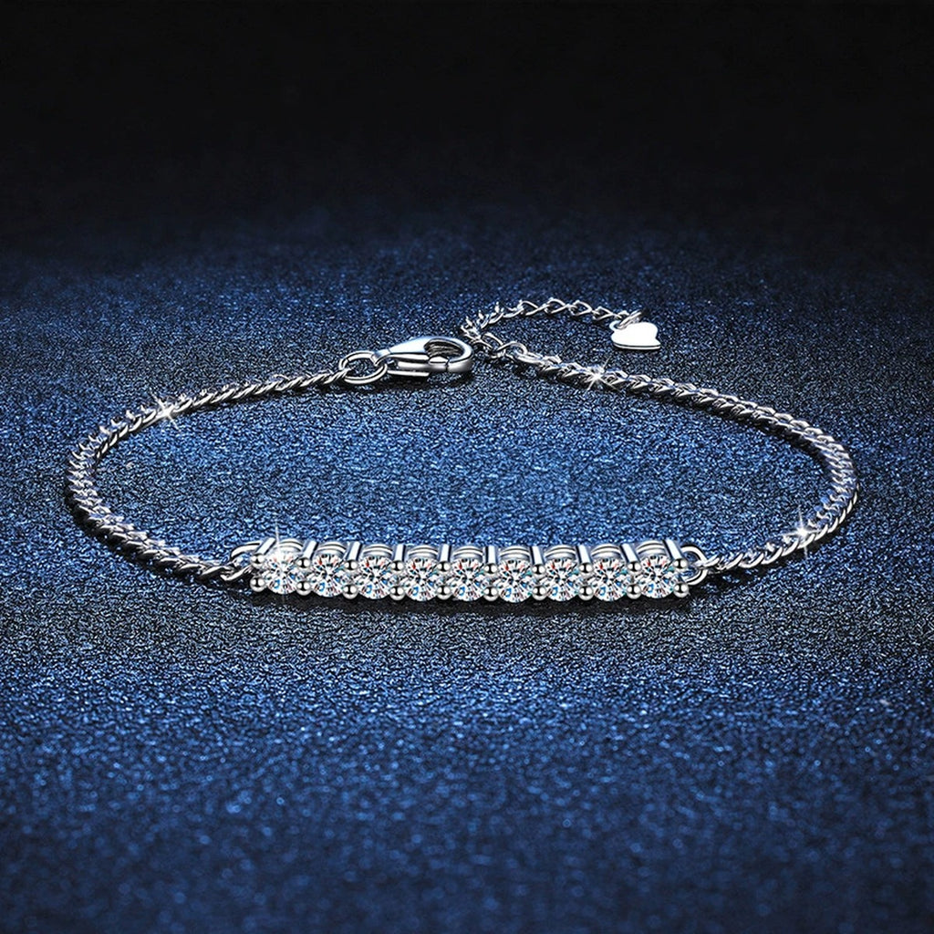 Moissanite Bar Tennis Bracelet styled on blue display background with visible moissanite sparkle