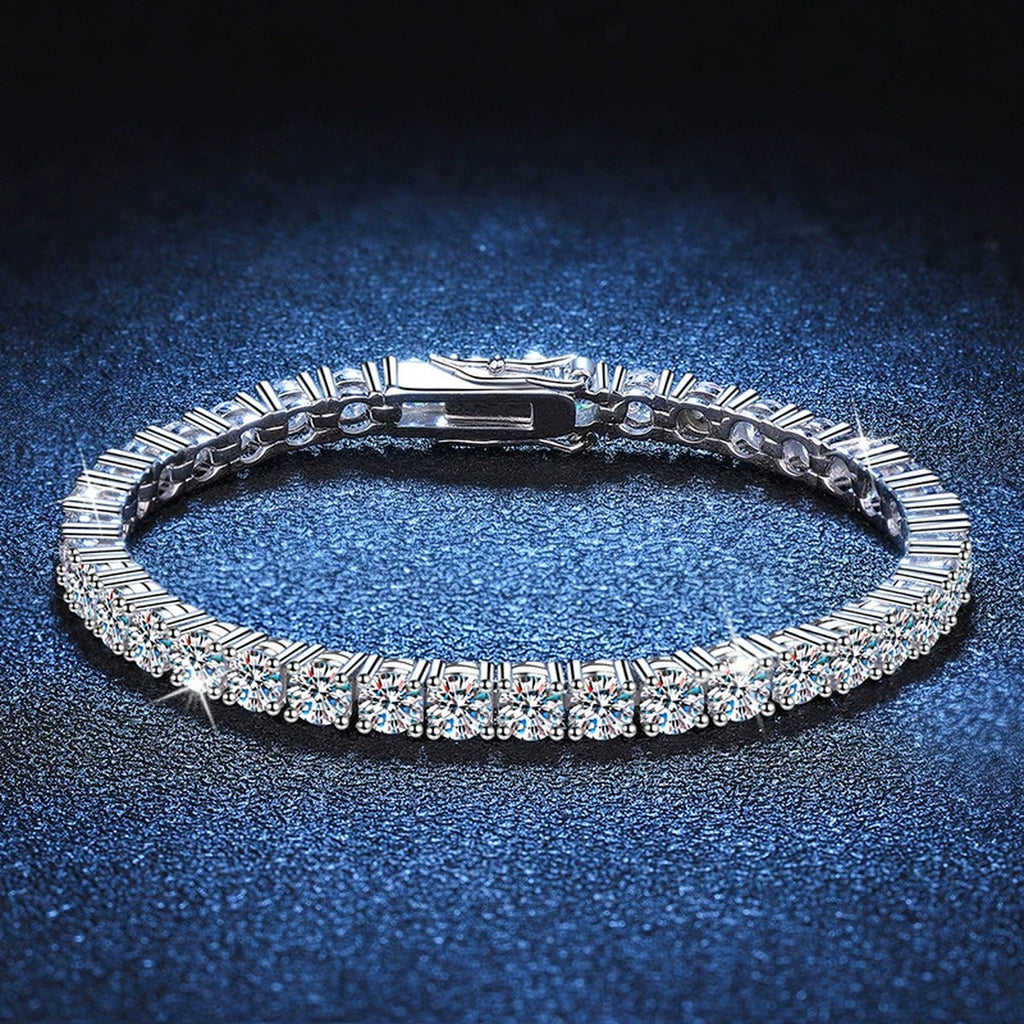 Moissanite Tennis Bracelet styled on blue display background with visible moissanite sparkle