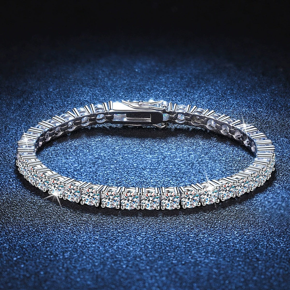 Moissanite Tennis Bracelet styled on blue display background with visible moissanite sparkle