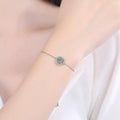 Moon and Star Moissanite Adjustable Bracelet with CZ worn on wrist by model showing scale and bracelet fit