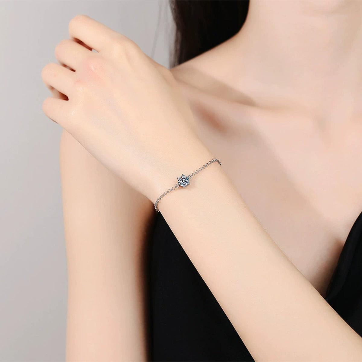 Starburst Moissanite Chain Bracelet worn on wrist by model showing scale and bracelet fit