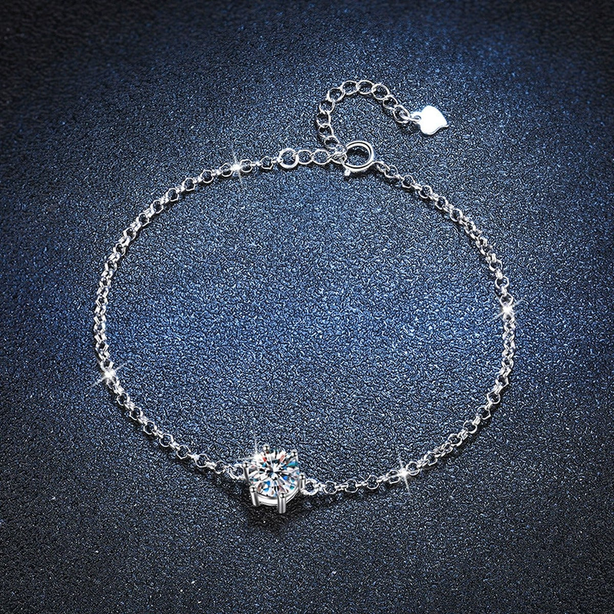 Starburst Moissanite Chain Bracelet styled on blue display background with visible moissanite sparkle