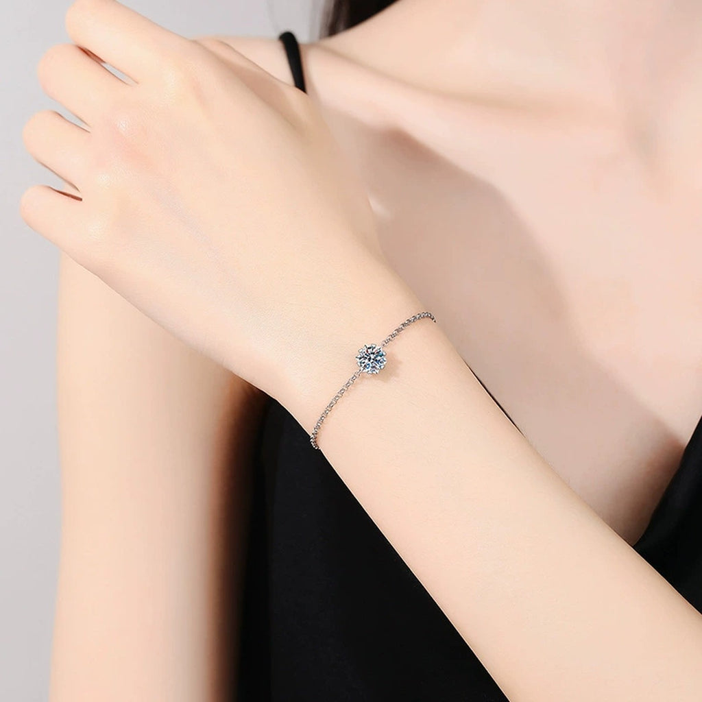 Round Halo Moissanite Chain Bracelet with CZ worn on wrist by model showing scale and bracelet fit