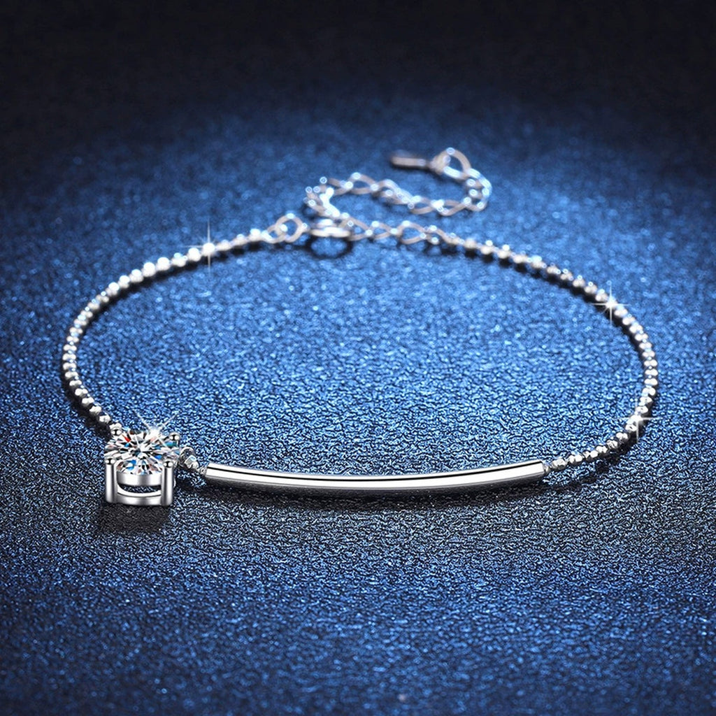 Moissanite Chain Bracelet and Anklet styled on blue display background with visible moissanite sparkle