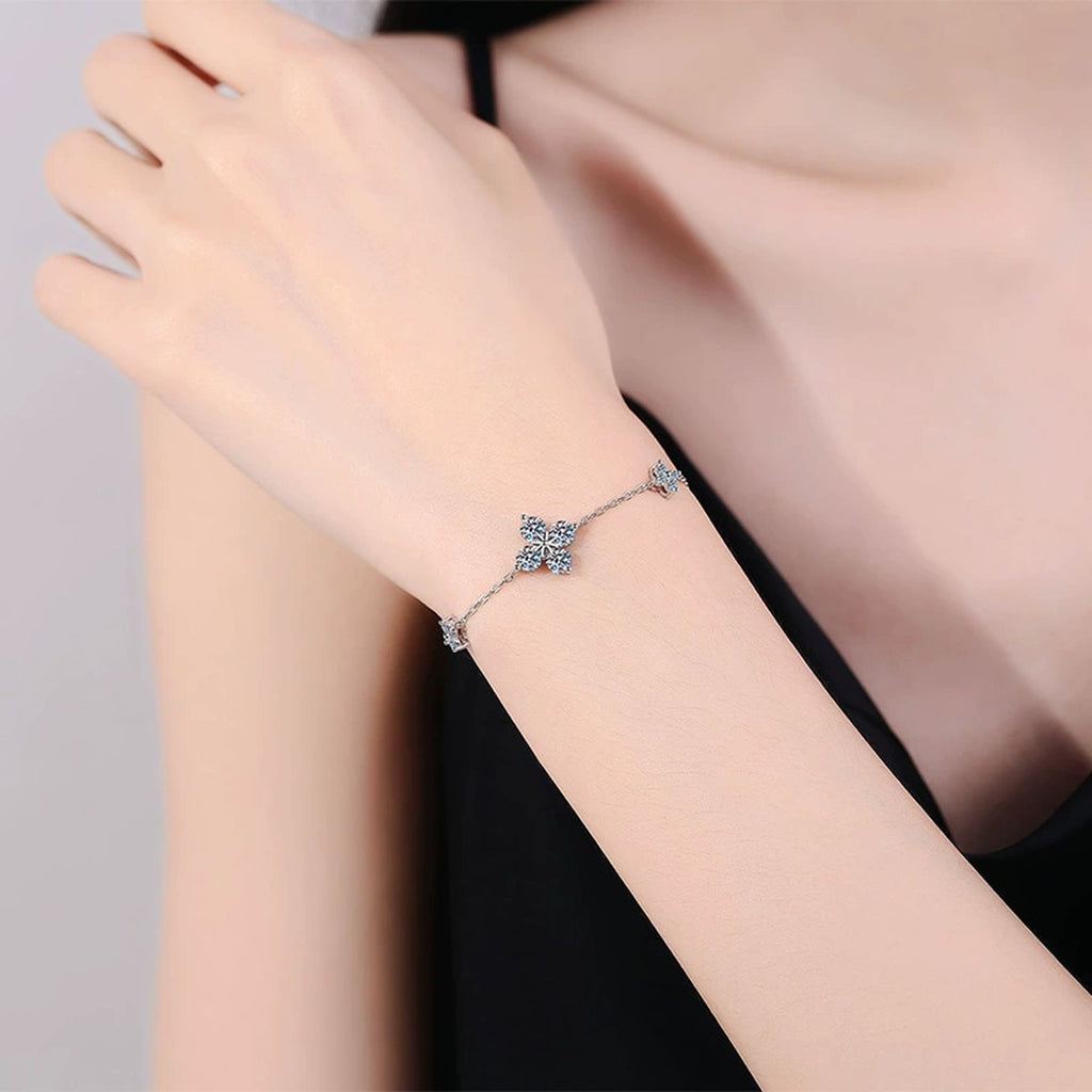 Floral Moissanite Station Bracelet with CZ worn on wrist by model showing scale and bracelet fit