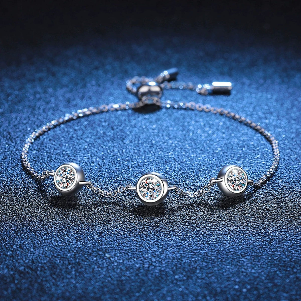 Three-Stone Moissanite Adjustable Station Bracelet close-up bracelet detail showing chain, setting, and stone placement