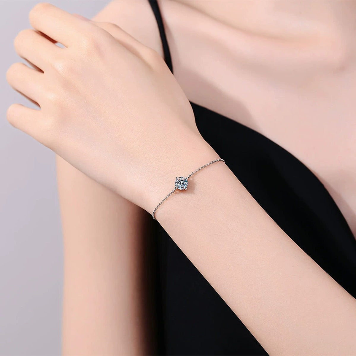 Round Moissanite Adjustable Station Bracelet worn on wrist by model showing scale and bracelet fit
