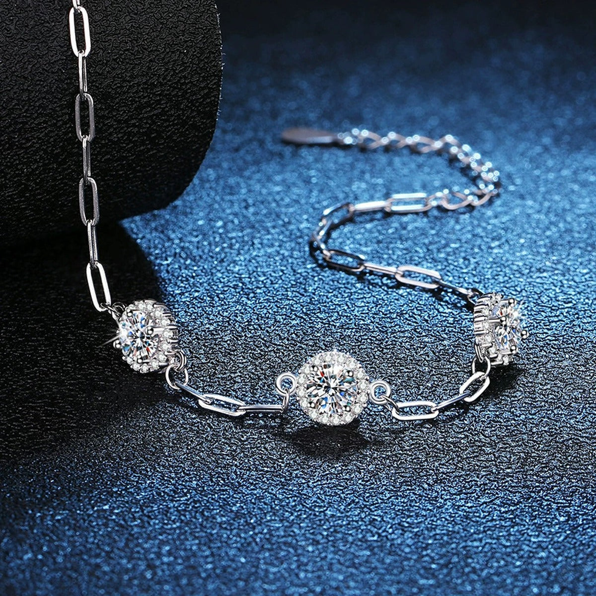 Three-Stone Round Moissanite Chain Bracelet with CZ close-up detail showing chain, clasp, and stone placement