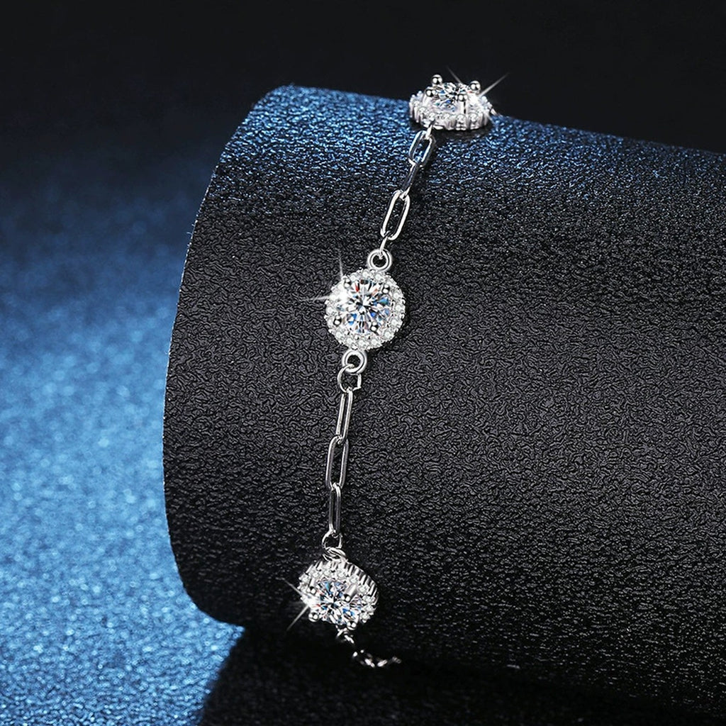 Three-Stone Round Moissanite Chain Bracelet with CZ close-up detail showing chain, clasp, and stone placement
