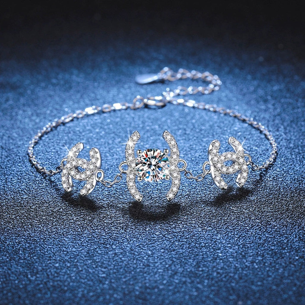 Butterfly Moissanite Chain Bracelet with CZ styled on blue display background showing moissanite sparkle