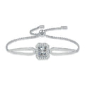 Pear Moissanite Adjustable Bangle Bracelet with CZ white background product photo showing bracelet silhouette and moissanite setting