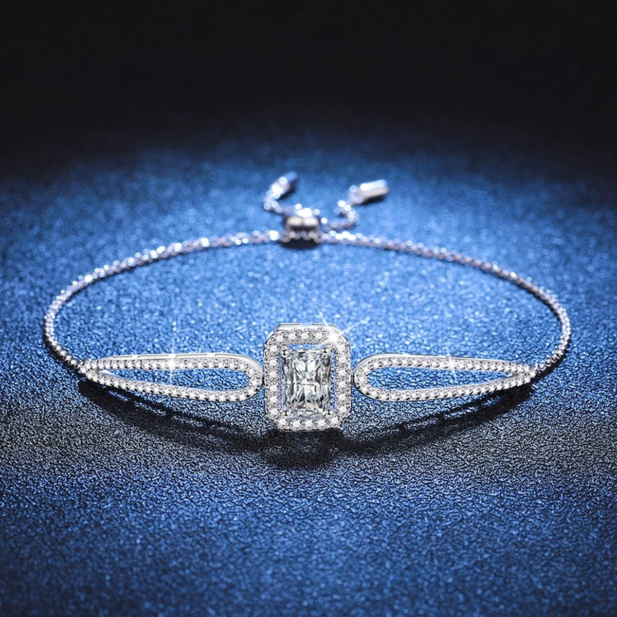 Pear Moissanite Adjustable Bangle Bracelet with CZ close-up detail showing chain, clasp, and stone placement