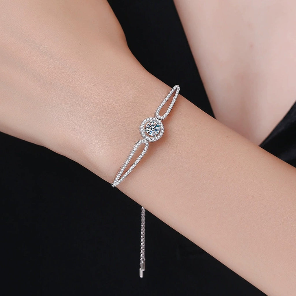Round Halo Moissanite Adjustable Bangle Bracelet with CZ close-up detail showing chain, clasp, and stone placement