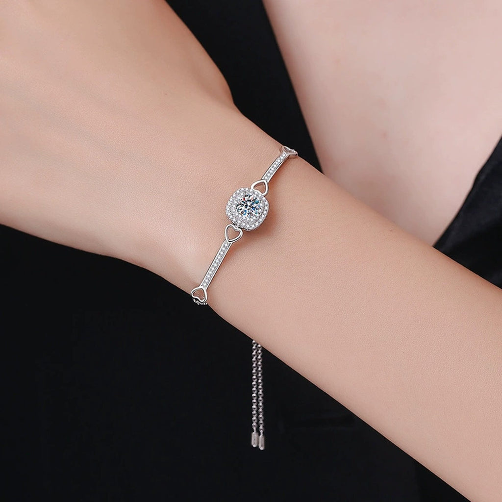 Round Moissanite Adjustable Bangle Bracelet with CZ worn on wrist by model showing bracelet scale and fit