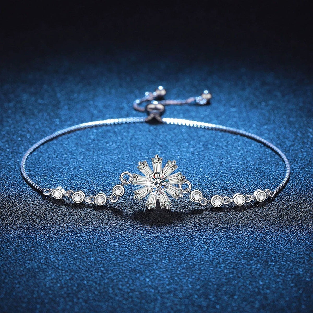 Floral Moissanite Chain Bracelet with CZ styled on blue display background showing moissanite sparkle