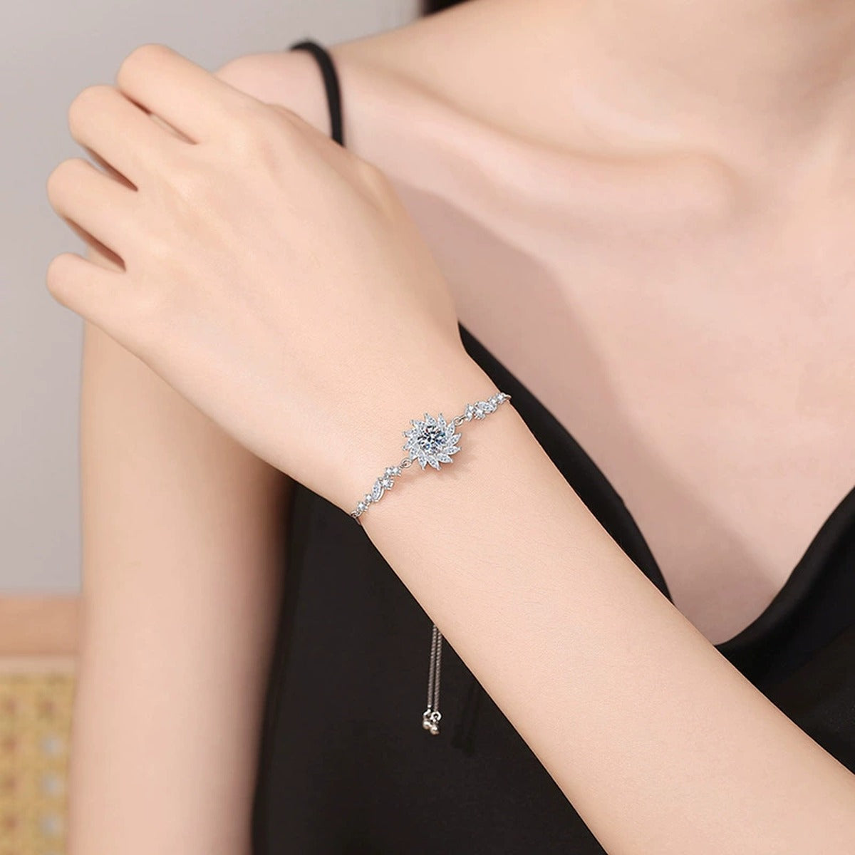 Starburst Moissanite Chain Bracelet with CZ styled on blue display background showing moissanite sparkle