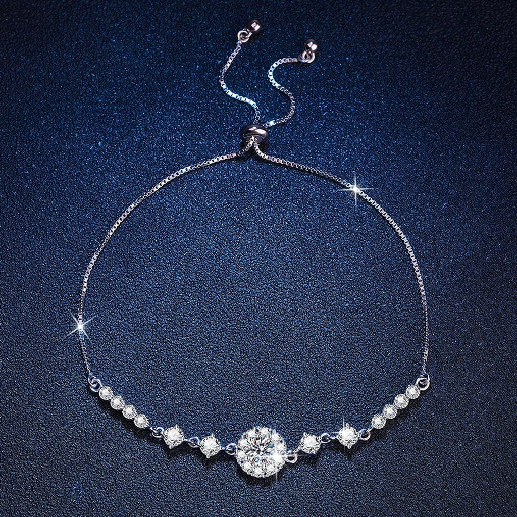 Clover Moissanite Chain Bracelet with CZ worn on wrist by model showing bracelet scale and fit