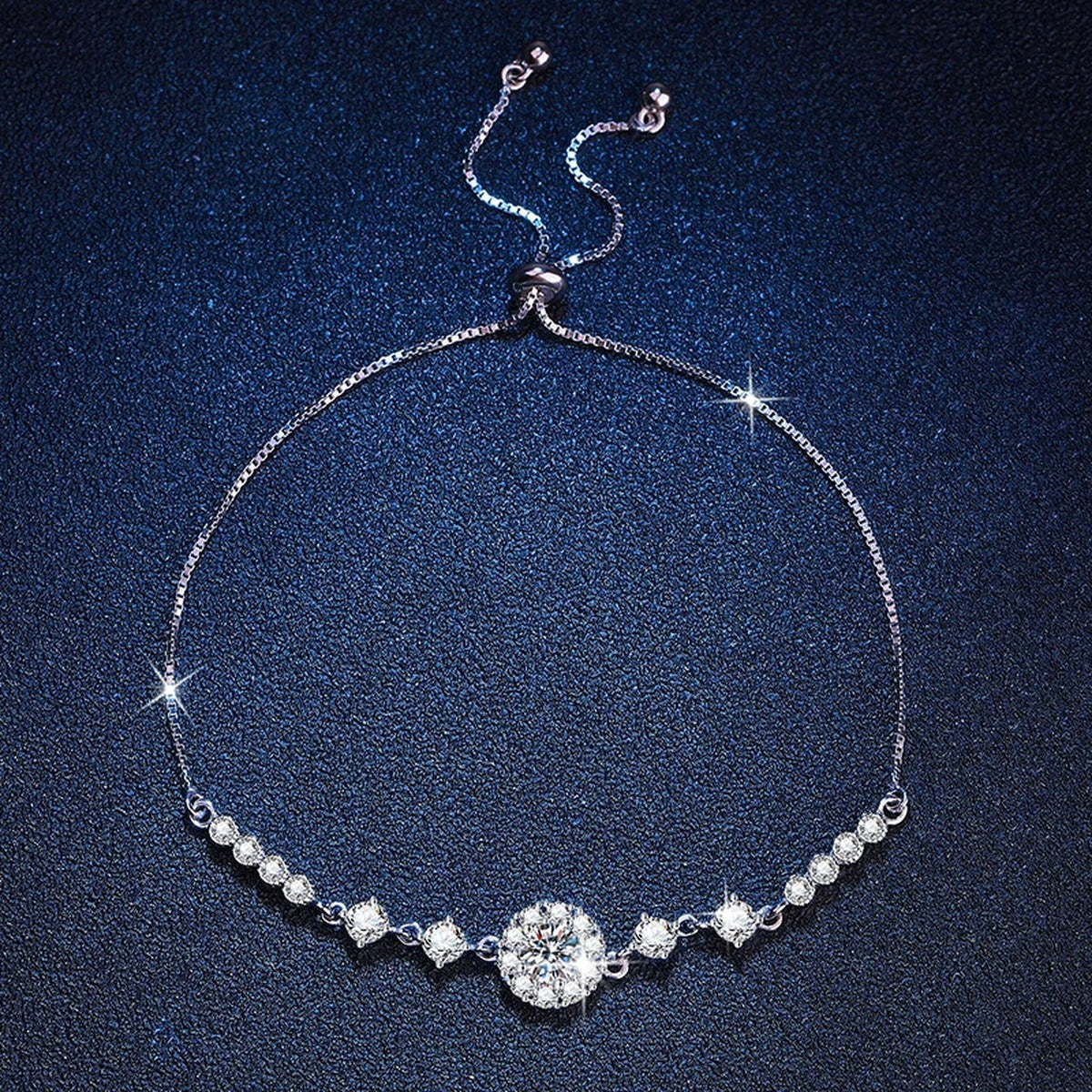 Clover Moissanite Chain Bracelet with CZ worn on wrist by model showing bracelet scale and fit