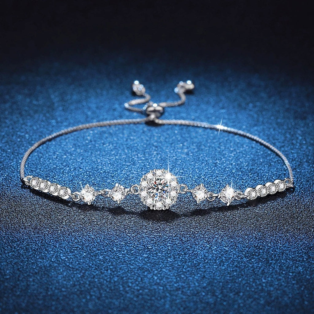 Clover Moissanite Chain Bracelet with CZ styled on blue display background showing moissanite sparkle