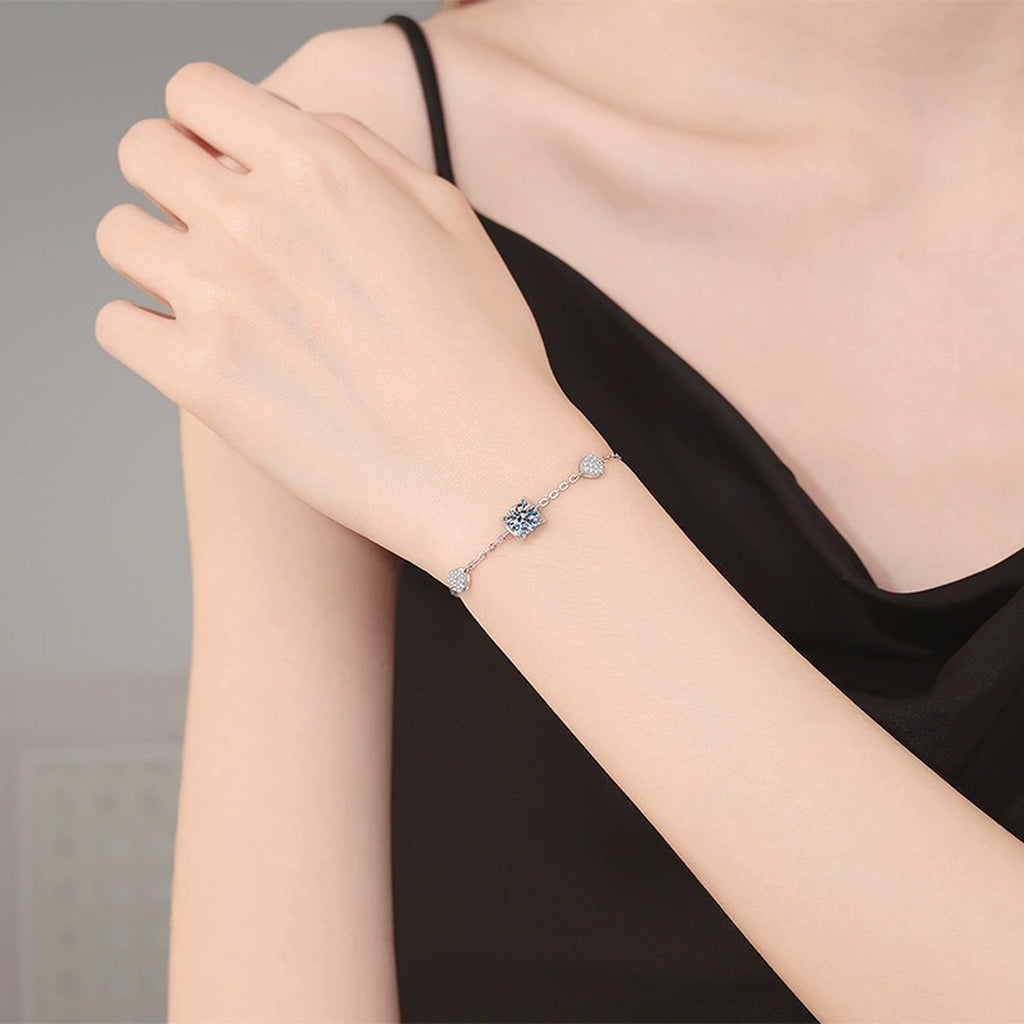 Floral Moissanite Chain Bracelet with CZ styled on blue display background showing moissanite sparkle