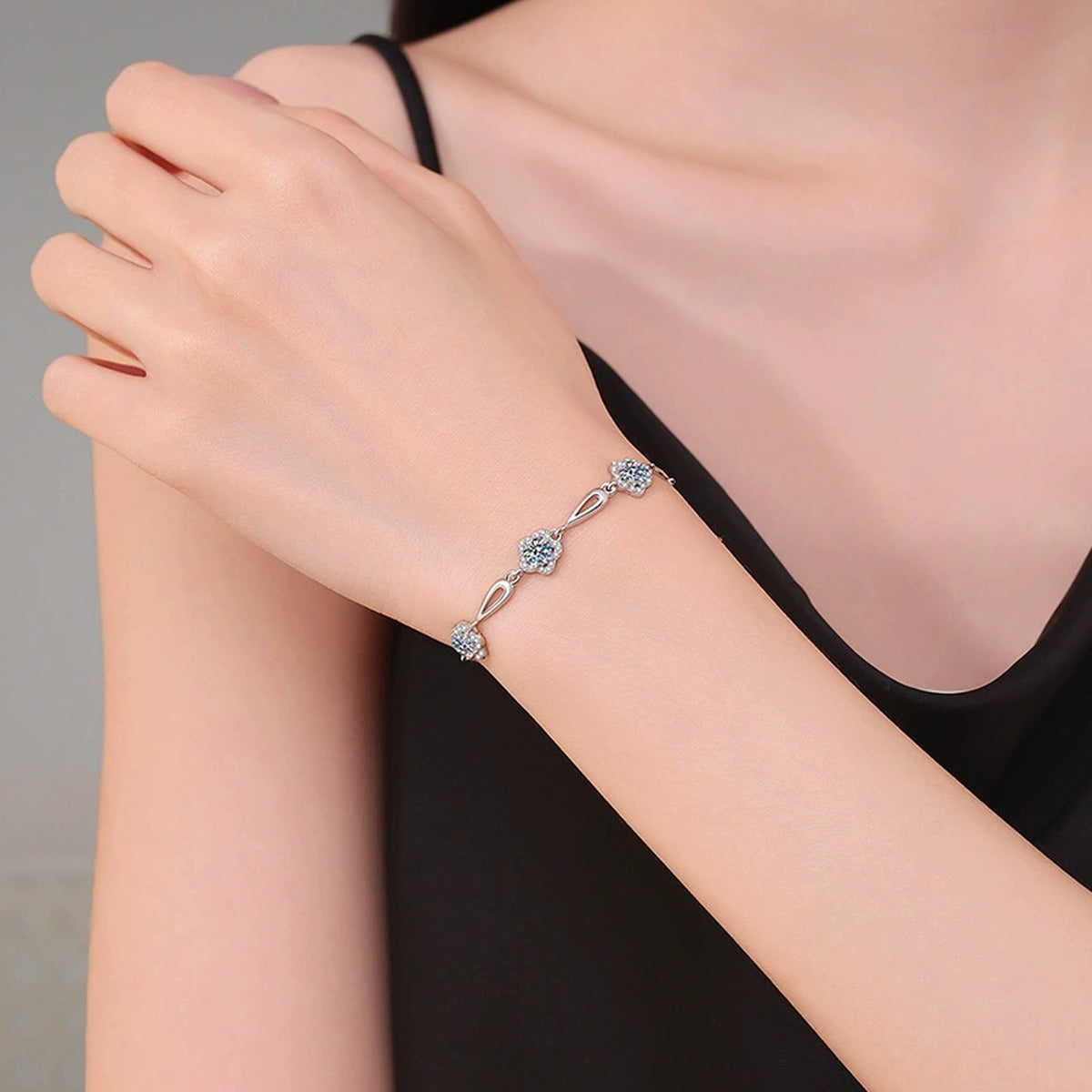 Round Moissanite Chain Bracelet with CZ worn on wrist by model showing bracelet scale and fit