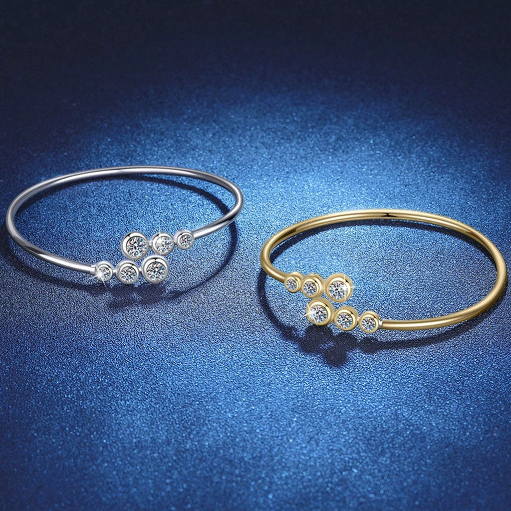 Three-Stone Moissanite Bangle Bracelet close-up detail showing chain, clasp, and stone placement