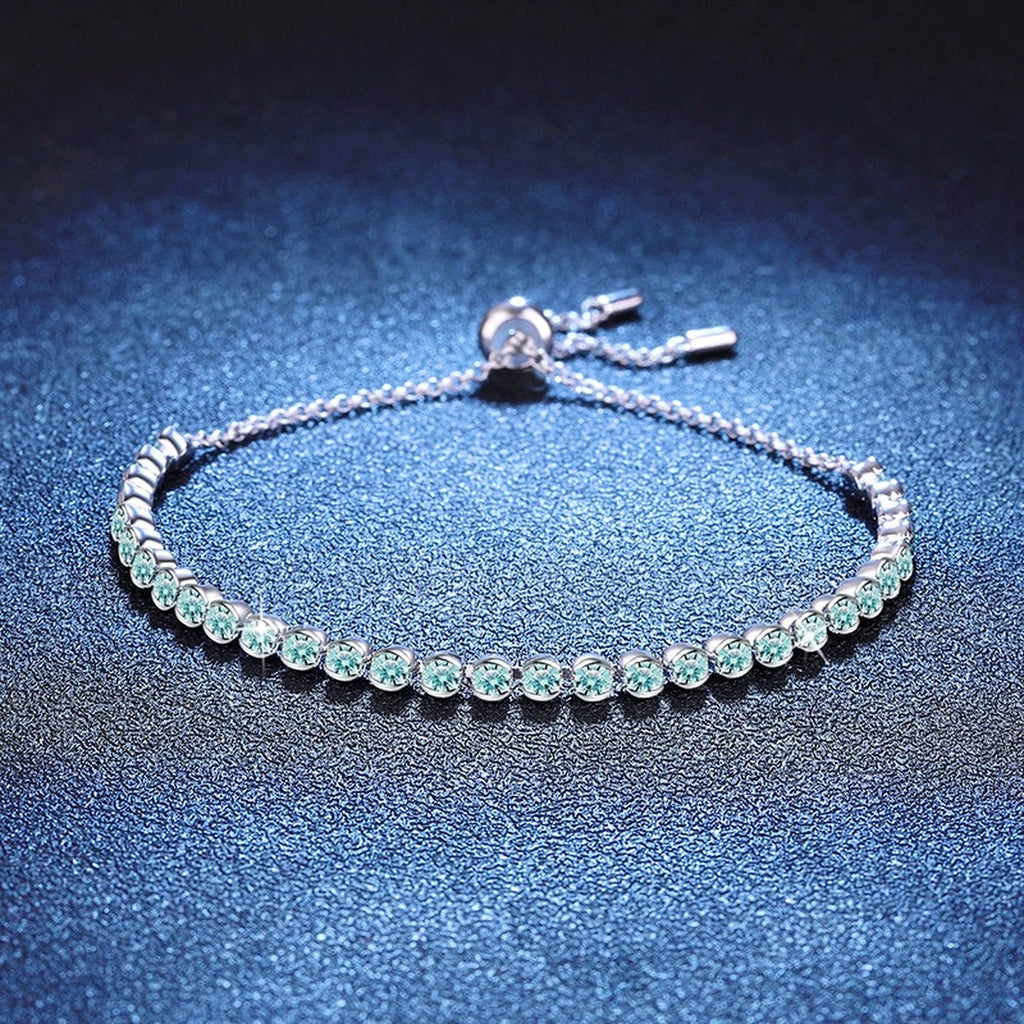 Aqua Moissanite Tennis Bracelet white background product photo showing bracelet silhouette and moissanite setting