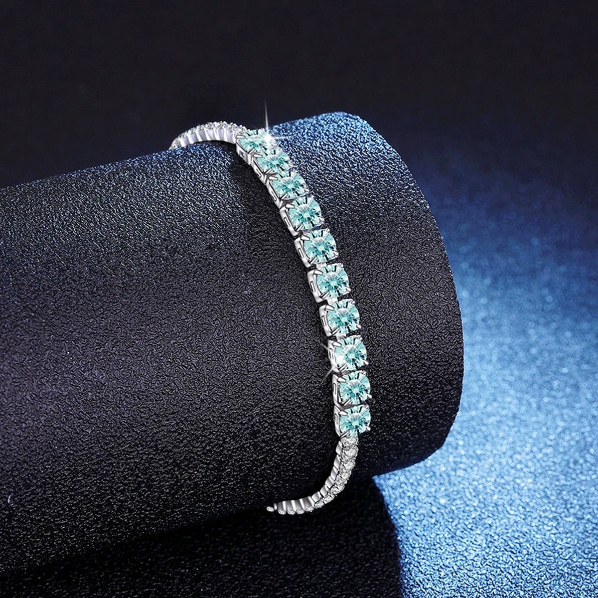 Aqua Moissanite Tennis Bracelet white background product photo showing bracelet silhouette and moissanite setting