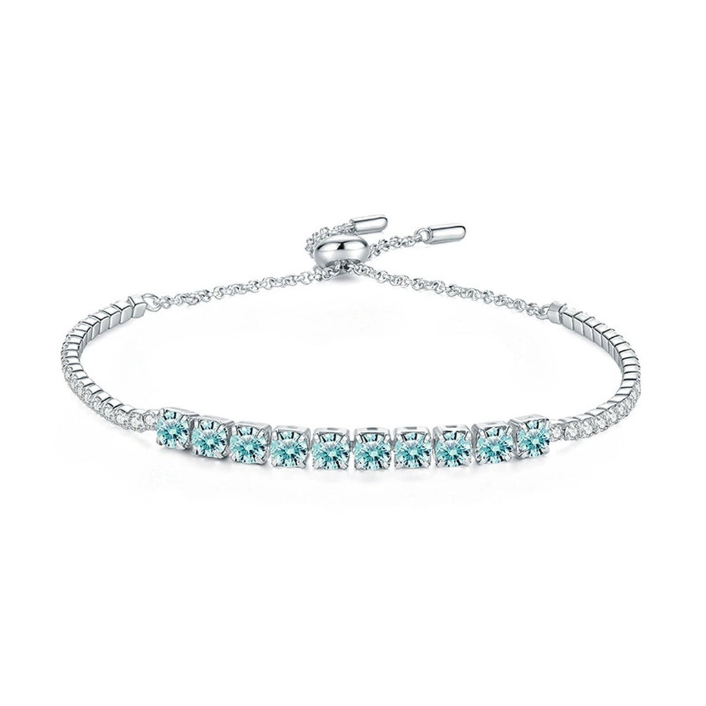 Aqua Moissanite Tennis Bracelet worn on wrist by model showing bracelet scale and fit