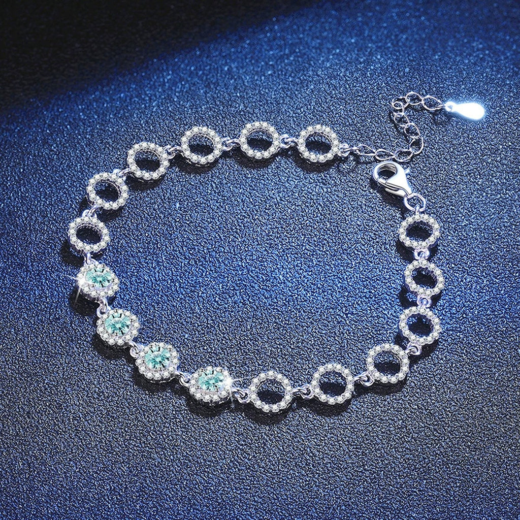 Aqua Moissanite Chain Bracelet with CZ white background product photo showing bracelet silhouette and moissanite setting