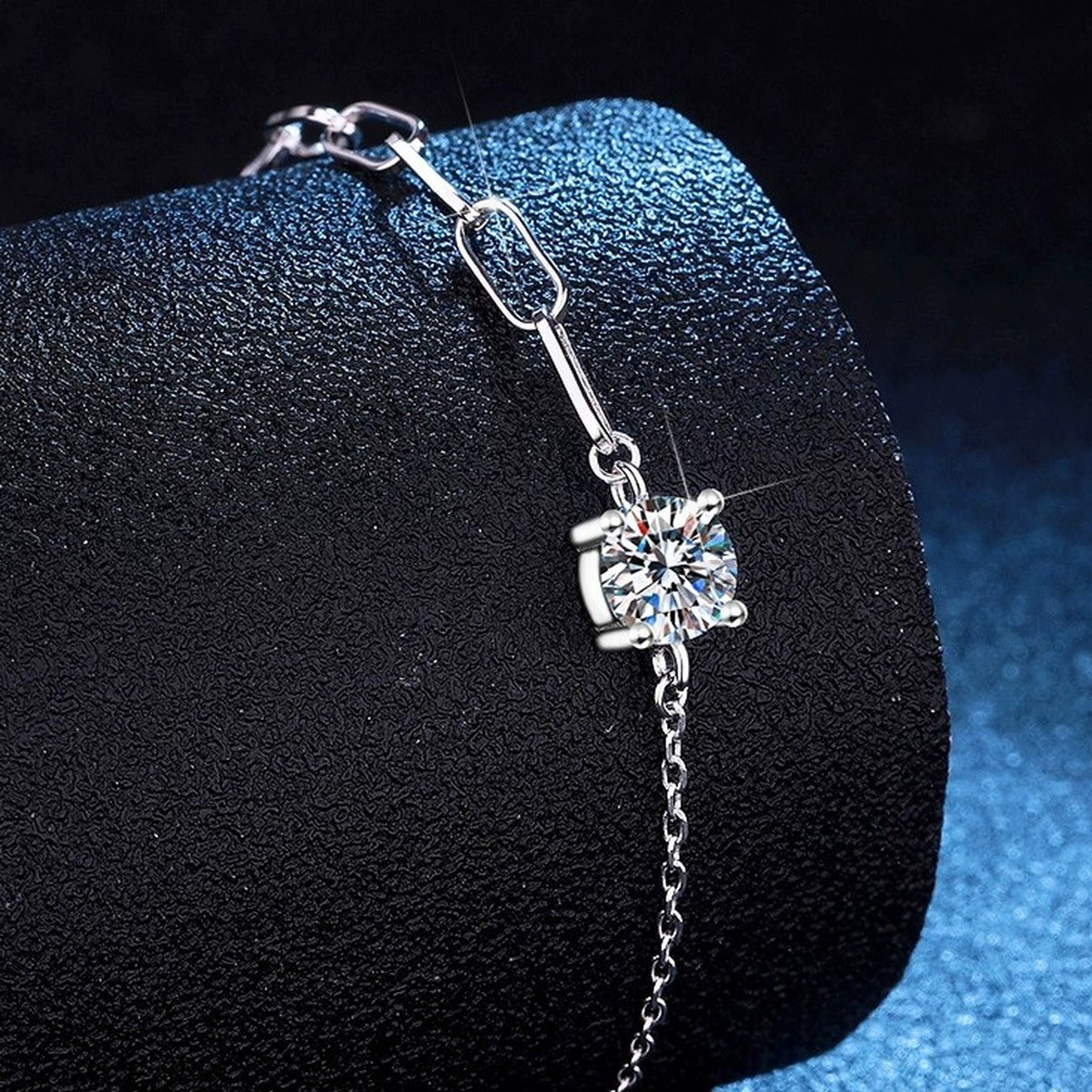Round Moissanite Chain Bracelet held in hand close-up showing bracelet scale and detail
