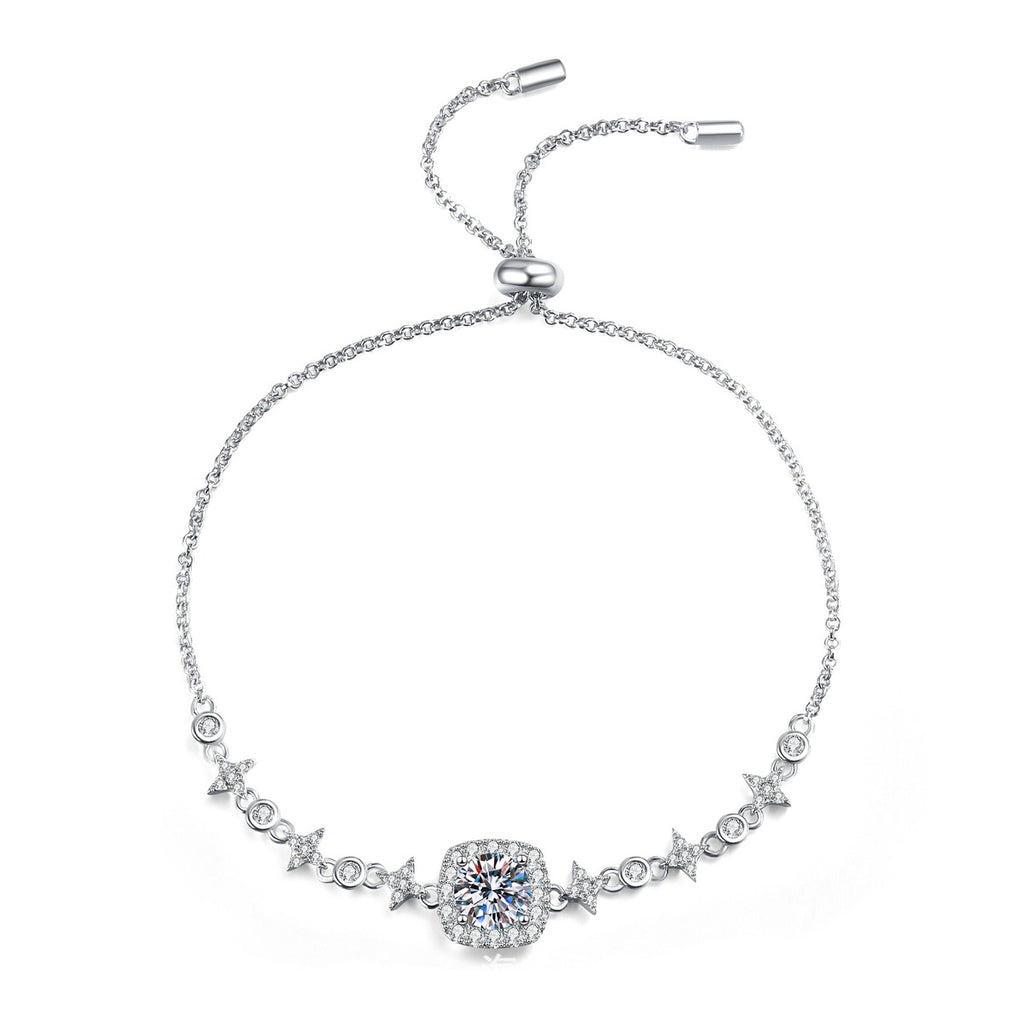 Round Moissanite Chain Bracelet with CZ styled on blue display background showing moissanite sparkle