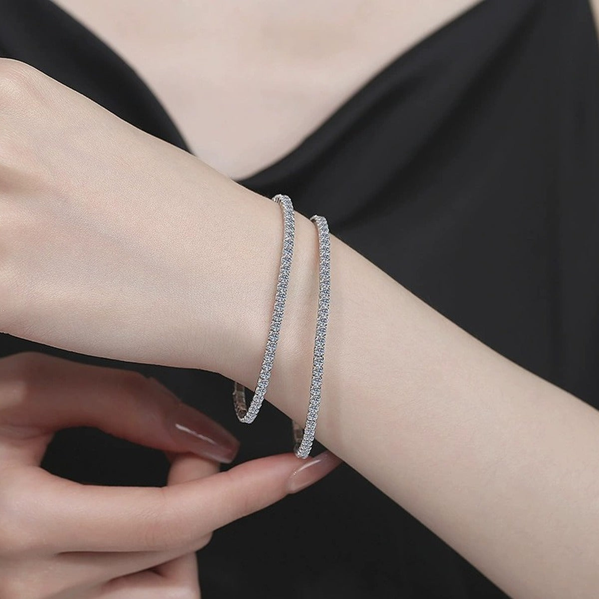 Moissanite Tennis Bangle Bracelet white background product photo showing bracelet silhouette and moissanite setting