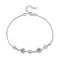 Graduated Moissanite Chain Bracelet with CZ white background product photo showing bracelet silhouette and moissanite setting