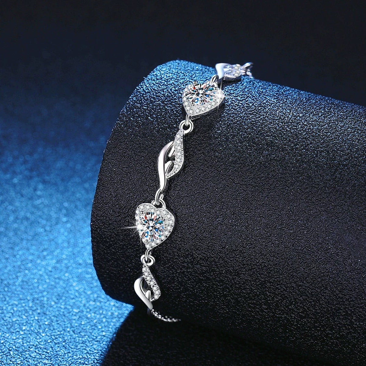 Graduated Moissanite Chain Bracelet with CZ worn on wrist by model showing bracelet scale and fit