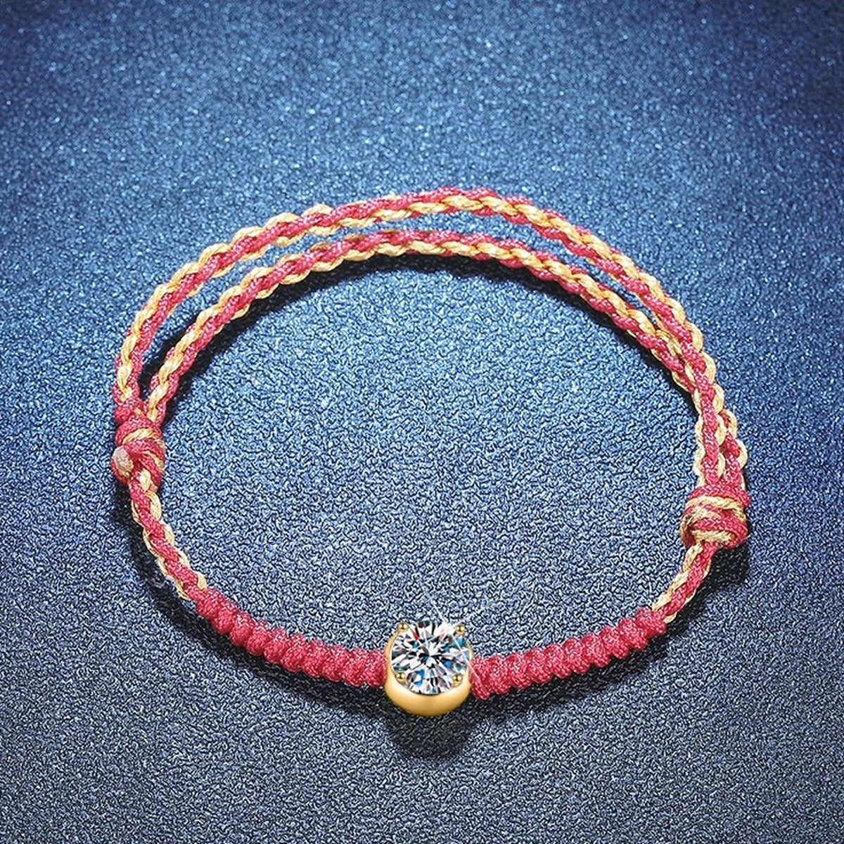 Red Cord Moissanite Bracelet styled on blue display background showing moissanite sparkle