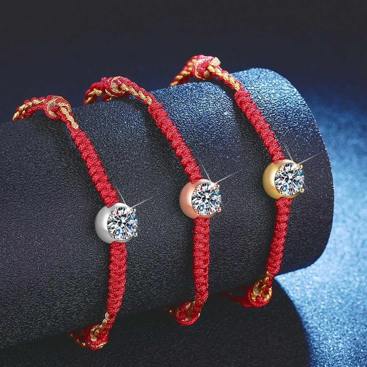 Red Cord Moissanite Bracelet held in hand close-up showing bracelet scale and detail