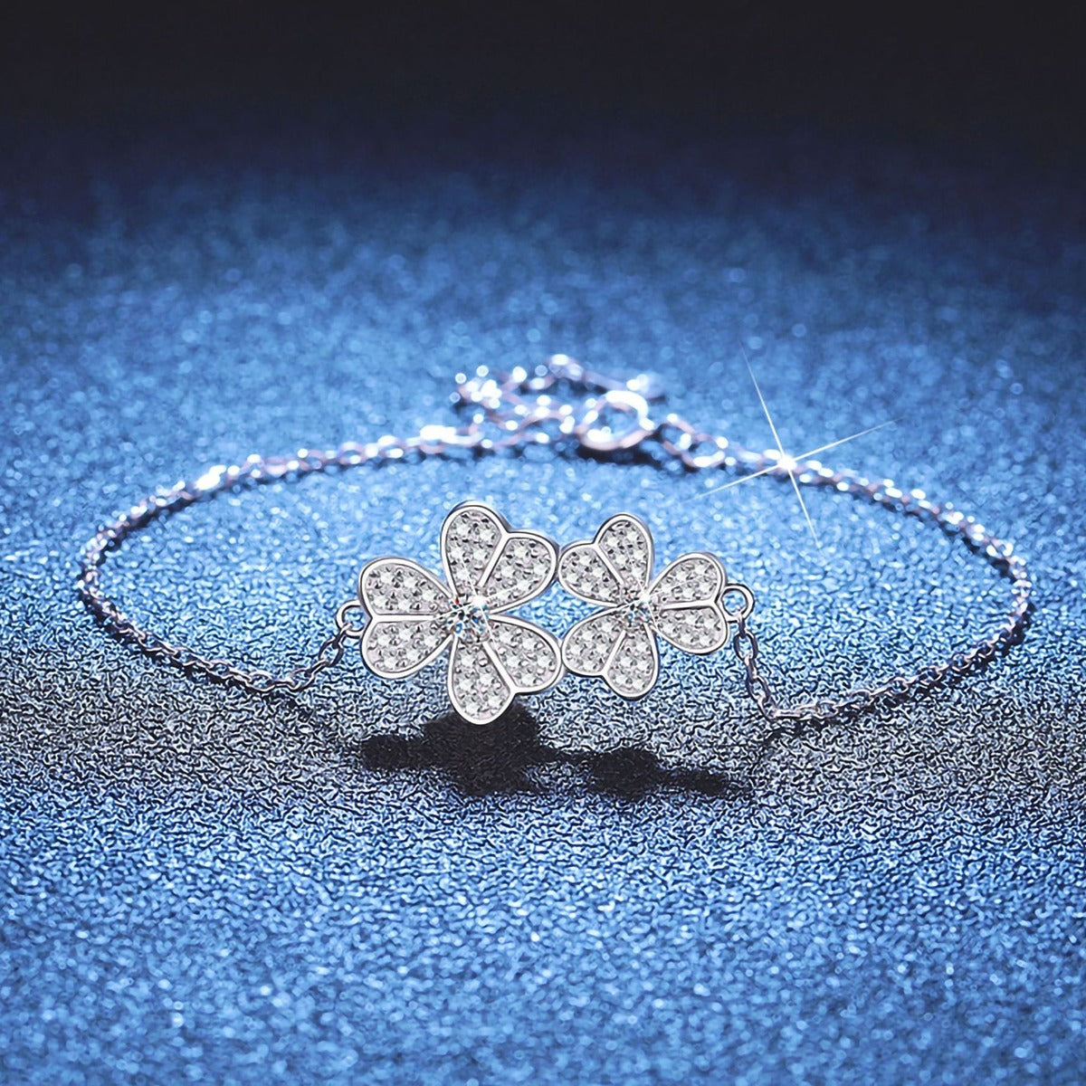 Cluster Moissanite Chain Bracelet styled on blue display background showing moissanite sparkle